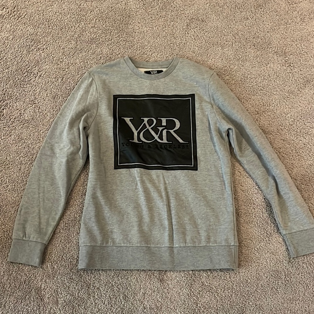 Young and reckless sweater